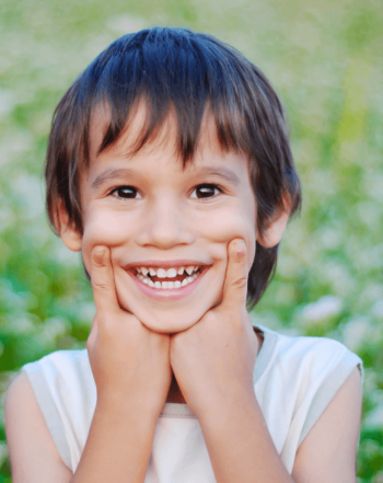 Smiling Kid showing her teeth